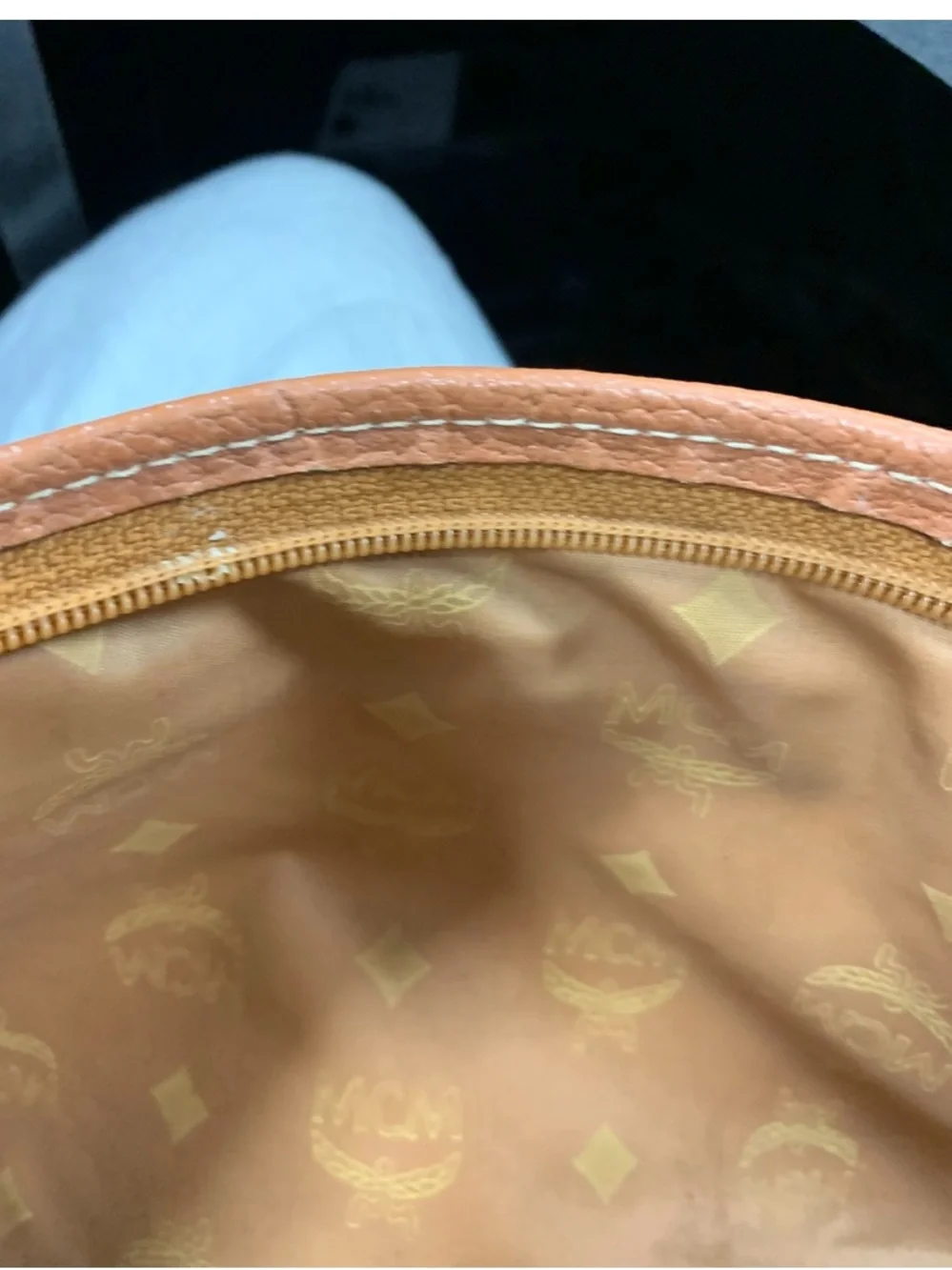 MCM Cognac and Black Visetos Monogram Pouch with Gold Plaque.